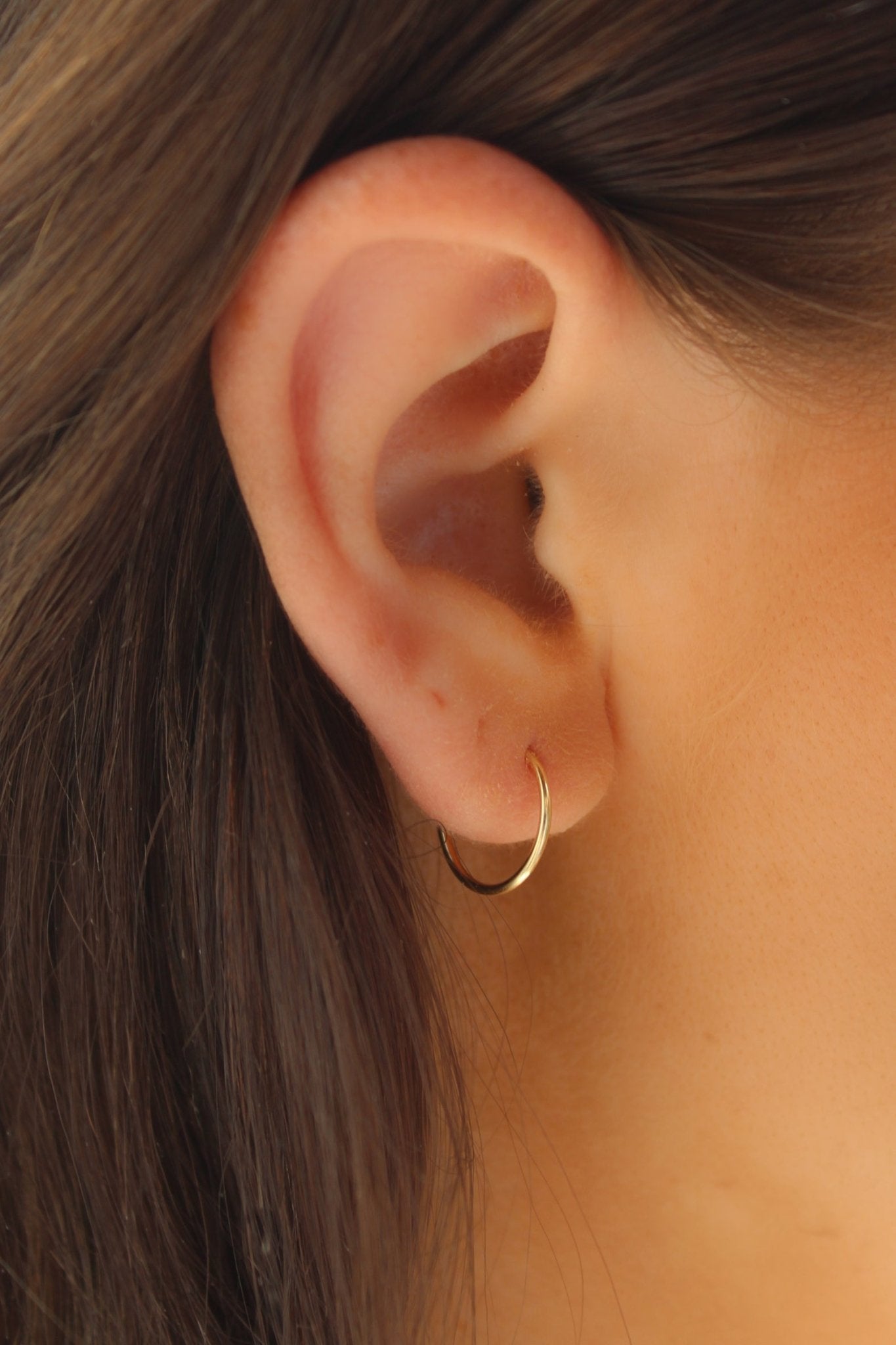 Slim gold hoop on sale earrings