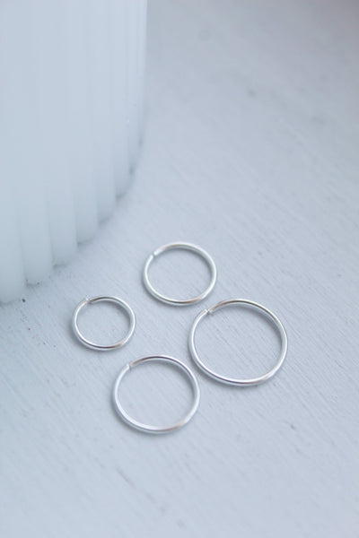 Small silver hoop nose on sale ring